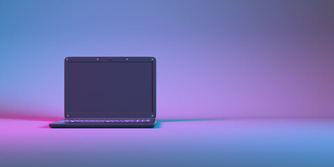 laptop in neon light close up