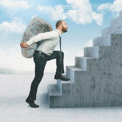 businessman climbs the stairs