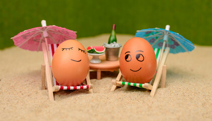 Fototapeta na wymiar easter funny eggs under umbrella
