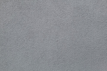 Grey painted stucco wall. Background texture
