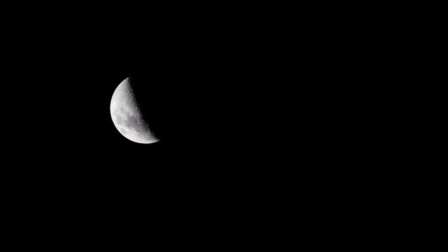 Third Quarter moon in a dark and clean sky