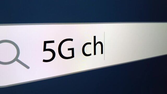 5G chipping written in search bar with cursor, computer monitor, close-up with camera zoom effect