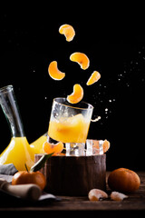 Tangerine liqueur in glass. Mandarine liquor
