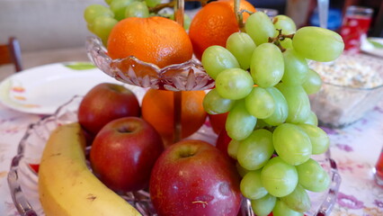 fresh fruit on a plate on the table 