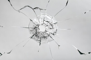 Cracks on the glass on a white background.