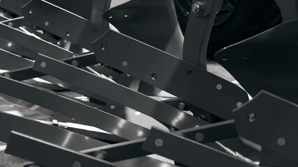 Modern cultivator for cultivating the land. Black and white image.