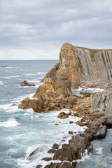 Fototapeta na wymiar Cliffs at Portio Beach, Santander