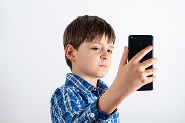 Boy looking at the smartphone