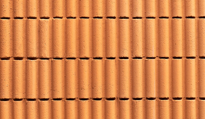 Orange pattern concrete wall texture background