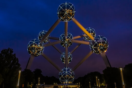 Night view of Brussels Atomium (1958) - silver atom model. Nine spheres represent an iron crystal magnified 165 billion times. BRUSSELS, BELGIUM. June 19, 2014.