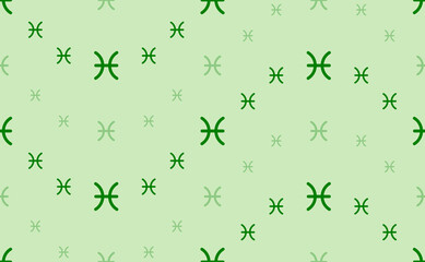 Seamless pattern of large and small green zodiac pisces symbols. The elements are arranged in a wavy. Vector illustration on light green background