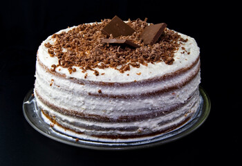 Cake with cottage cheese cream and chocolate chips.
