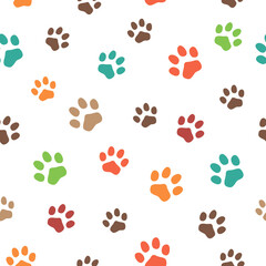 Fototapeta na wymiar Seamless background with animal footprints. Traces of cats and dogs. Traces of wild animals.