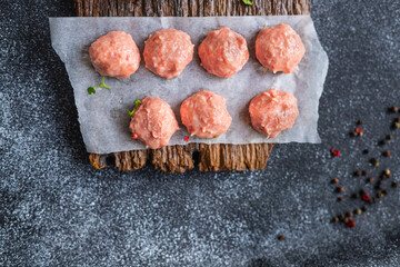 raw meatballs minced meat pork, beef, lamb, chicken meat cutlet healthy meal top view copy space for text food background rustic
