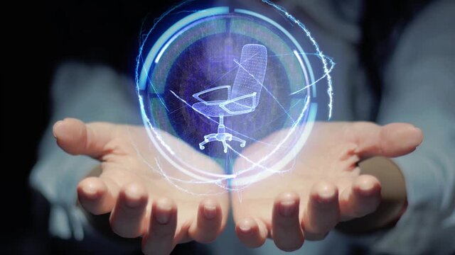Female hands show a round conceptual hologram with headmaster chair. Unrecognizable woman in ashen white on a black background with future holographic technology