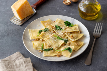 Ravioli with ricotta cheese, spinach and nuts. Healthy eating. Vegetarian food. Italian cuisine.