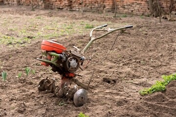 motor cultivator machine in garden