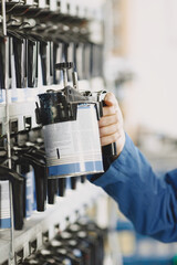 Sanding and painting machine in garage with tools