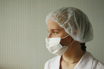 Female Doctor Or Nurse In Mask. health care concept. Medical concept