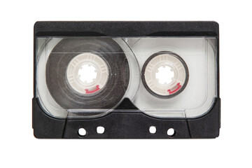 A shabby audio cassette in a transparent plastic and black case, isolated on a white background