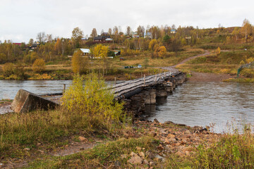 Fototapeta na wymiar old wooden bridge for cars