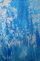 blue paint on a wooden wall