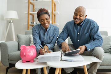 Happy Couple Doing Retire Finances Plan