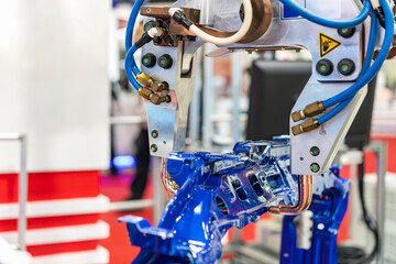 electrode resistance spot welding with robot during simulated position point arc or spark for assembly body frame automobile part in manufacturing process