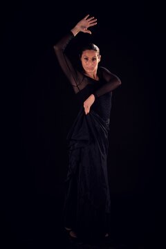 flamenco woman with black dress and hand gesture