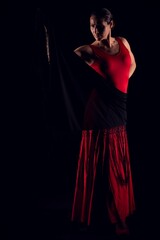 flamenco woman red skirt and bullfighter pass