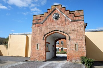 Fototapeta premium Stable yard gateway at Chalfont Park, designed by Richard Bentley and constructed in 1755.