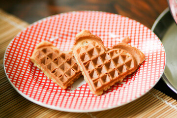 Waffles cookies on a red checkered plate