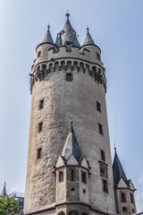 Fototapeta na wymiar Eschenheim Tower (Eschenheimer Turm) was a city gate, part of medieval fortifications of Frankfurt am Main - a landmark of city. Tower erected at beginning of XV century. Frankfurt am Main, Germany.