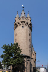 Obraz premium Eschenheim Tower (Eschenheimer Turm) was a city gate, part of medieval fortifications of Frankfurt am Main - a landmark of city. Tower erected at beginning of XV century. Frankfurt am Main, Germany.