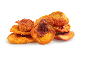 Several slices dried peaches isolated on white