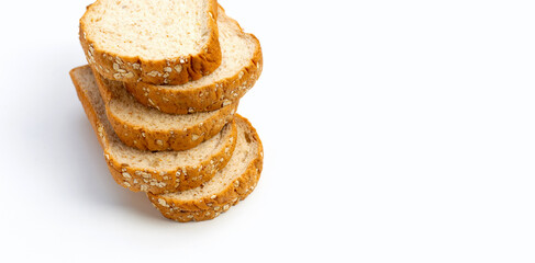 Sliced whole wheat bread on white background.