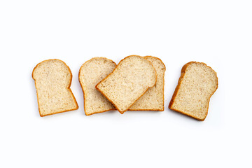 Sliced whole wheat bread on white background.