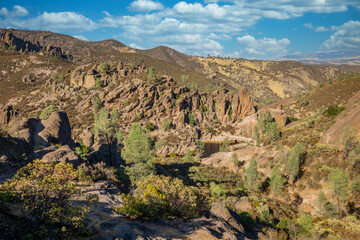 Rock formations in Pinnacles National Park in California, the destroyed remains of an extinct volcano on the San Andreas Fault. Beautiful landscapes, cozy hiking trails for tourists and travelers.