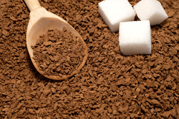 Coffee. Sugar. A spoon with coffee granules. Instant coffee close-up.