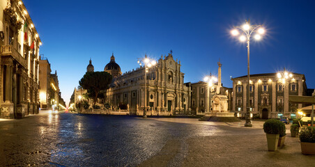 Fototapeta na wymiar Illuminated Piazza Duomo, Catania, Sicily, Italy in the evening. Cathedral of Santa Agatha and Liotru, symbol of Catania in the evening