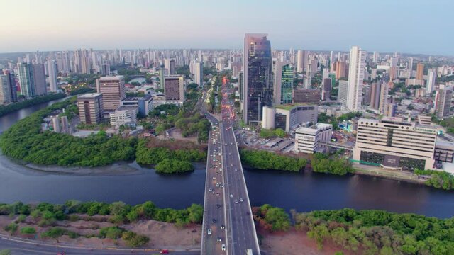 12 STATIC AERIAL IMAGE OF AVENIDA AGAMENON MAGALHAES SHOWING BUILDINGS, THE BRIDGE AND ORIO CAPIBARIBE IN THE FOREGROUND