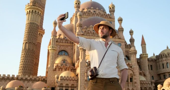 safari style traveler, takes a selfie Tourism Image,Best Places to visit in Dubai, Amazing architecture Design, Islamic concept Ramadan and Eid Background 2021, Beautiful Mosque in the world
