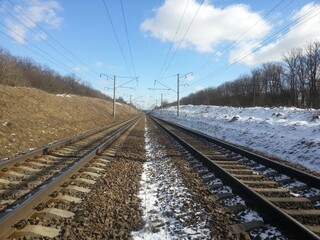 Fototapeta na wymiar Spring's and Winter's railway (small hills)
