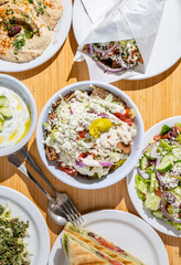 Lamb shawarma bowl topped with gyro meat and feta cheese. Healthy Greek food. 
