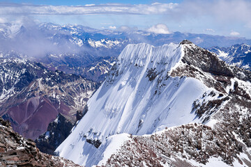 Fototapeta na wymiar Aconcagua south summit view from North summit, at 6962 meters. Aconcagua Provincial Park, Mendoza, Argentina, South America.
