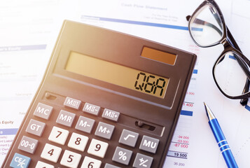 Word Q&A - questions and answers, on the display of a calculator on financial documents.