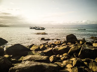 Fotobehang Fishing boats on the sunset. © Rafael