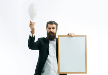 Young handsome bearded man scientist or professor holding teacher board isolated on white...