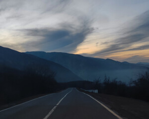 Naklejka premium road to the mountains