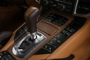 Obraz na płótnie Canvas Sport car interior background. Automatic transmission in modern luxury car.